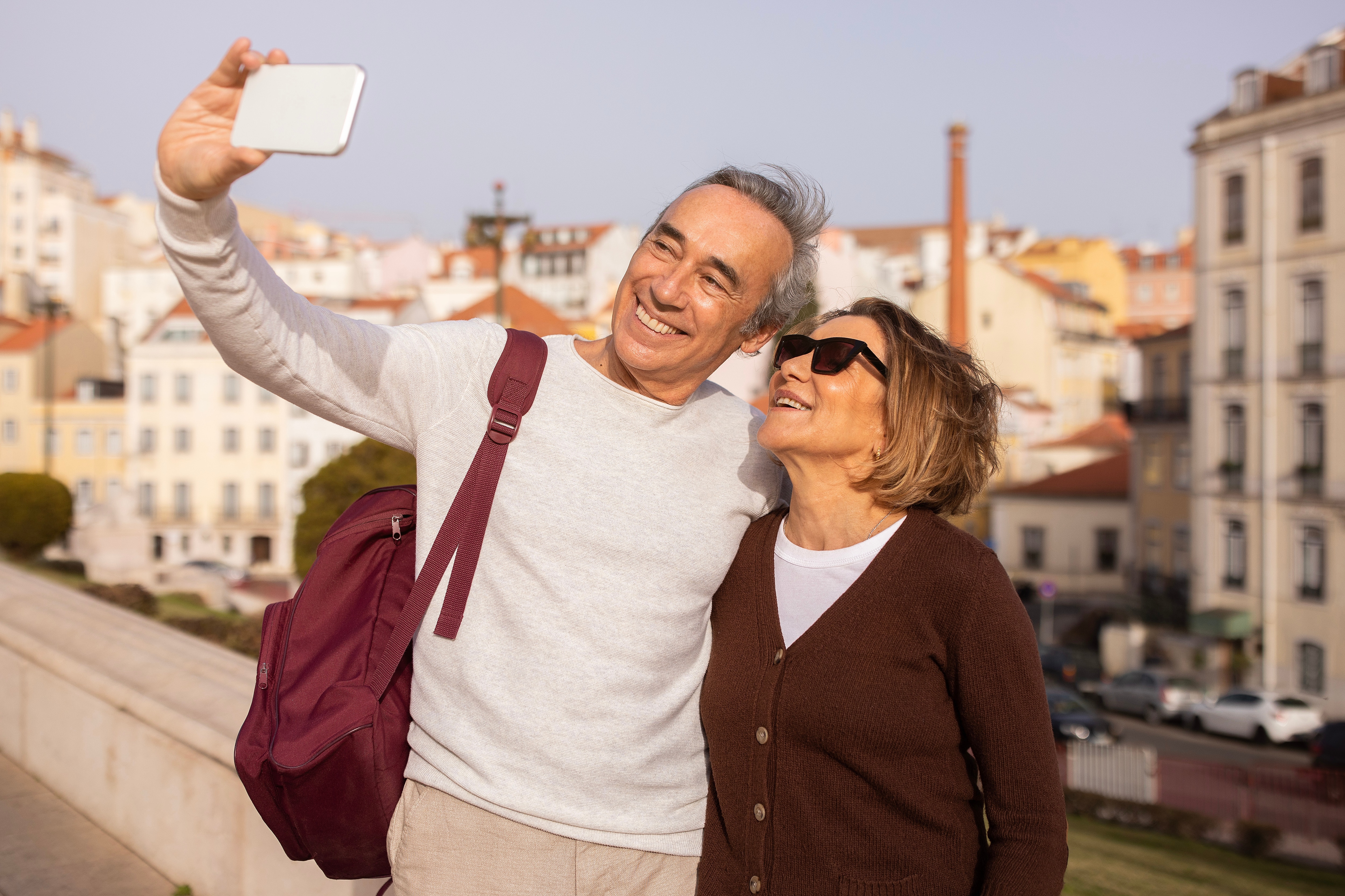 Travelers capturing memories during a city trip