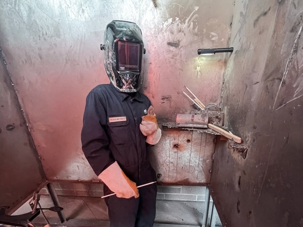 Noah Lopez in welding uniform