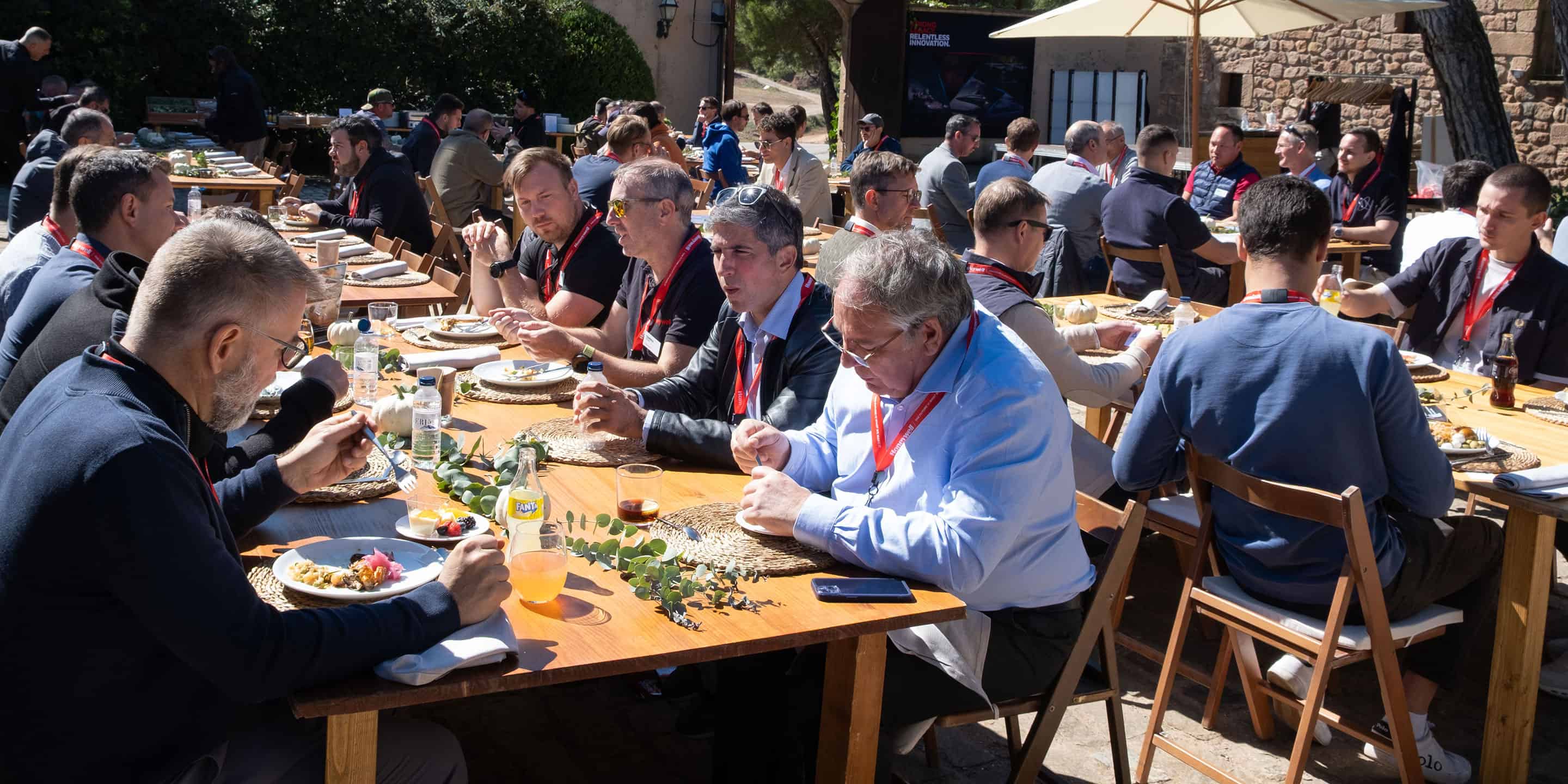 Participants enjoy a networking lunch at HON Aero’s outdoor technical event, fostering collaboration and knowledge sharing among attendees.