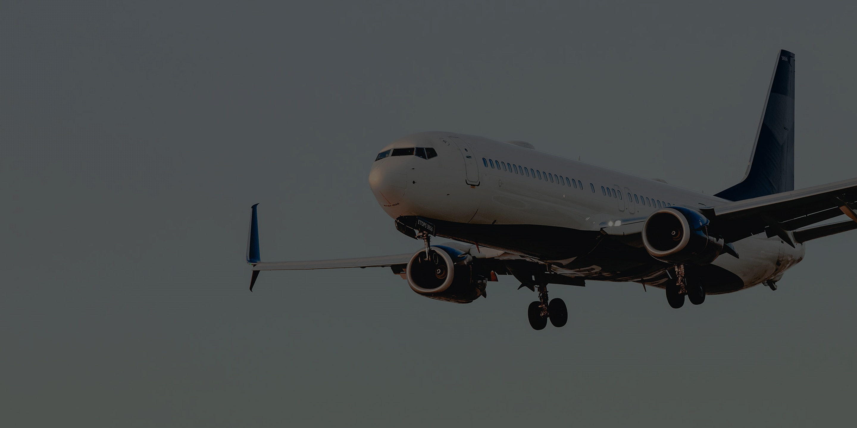 Commercial airplane gliding smoothly through the air.